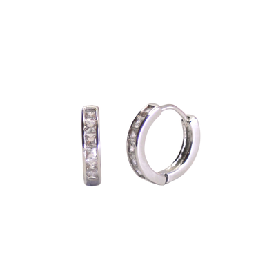 Pair of silver clicker huggie hoop earrings with embedded stones on a white background